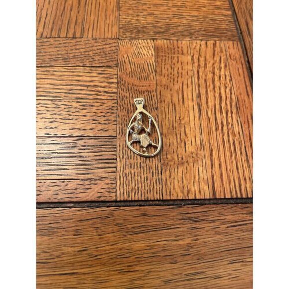 Gold tone Virgo zodiac pendant